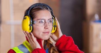 Female Student with Workshop Equipment