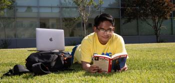 Student Reading a Book