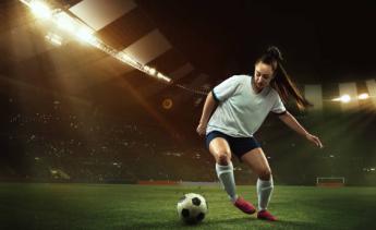 Female Athlete playing soccer