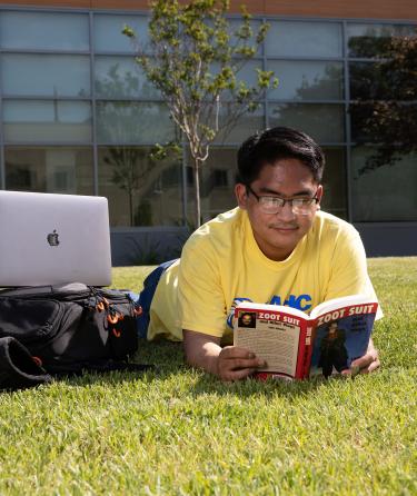 Student Reading a Book