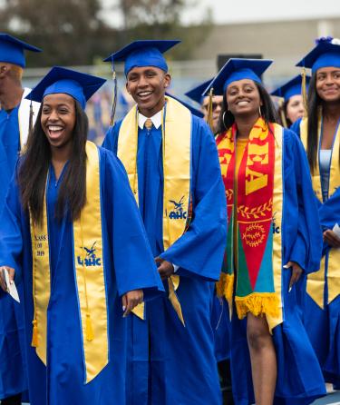 Students Walking at Graduation