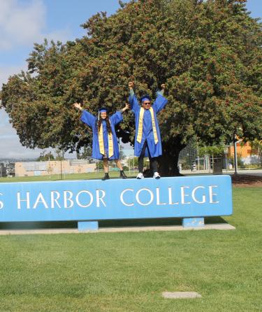 Two Students Over LAHC Sign