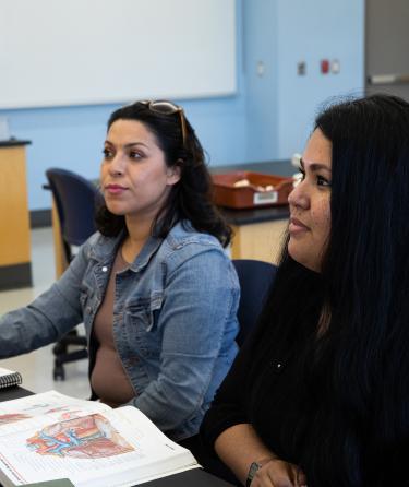 Two Females Students in Anatomy Class