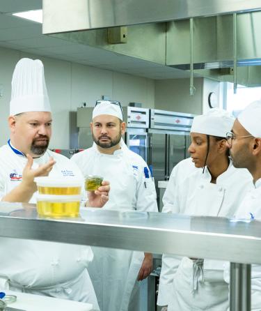 Chef Explaining to Students