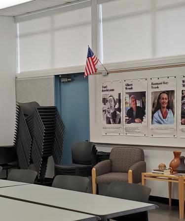 Image of APASS classroom with hanging posters of API activists and hand painted tapa cloths 