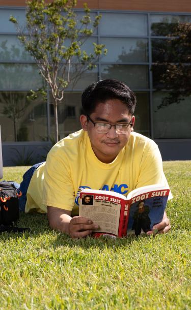 Student Reading a Book