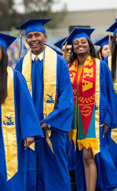 Students Walking at Graduation Event