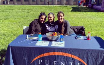 Three Women Students Sitting at a Table