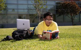 Student Reading a Book