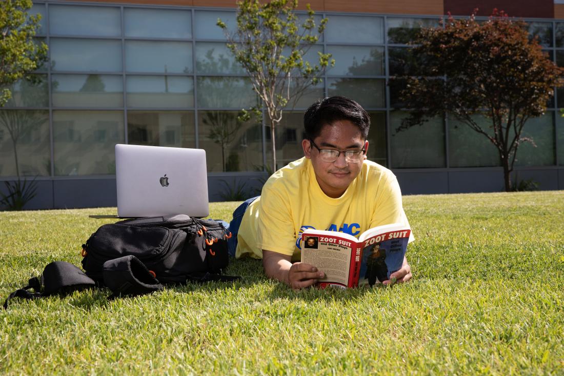 Student Reading a Book