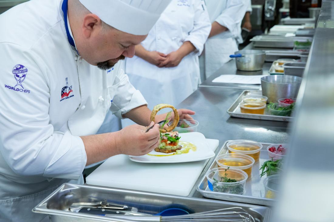 Working Cheff in Front of His Class