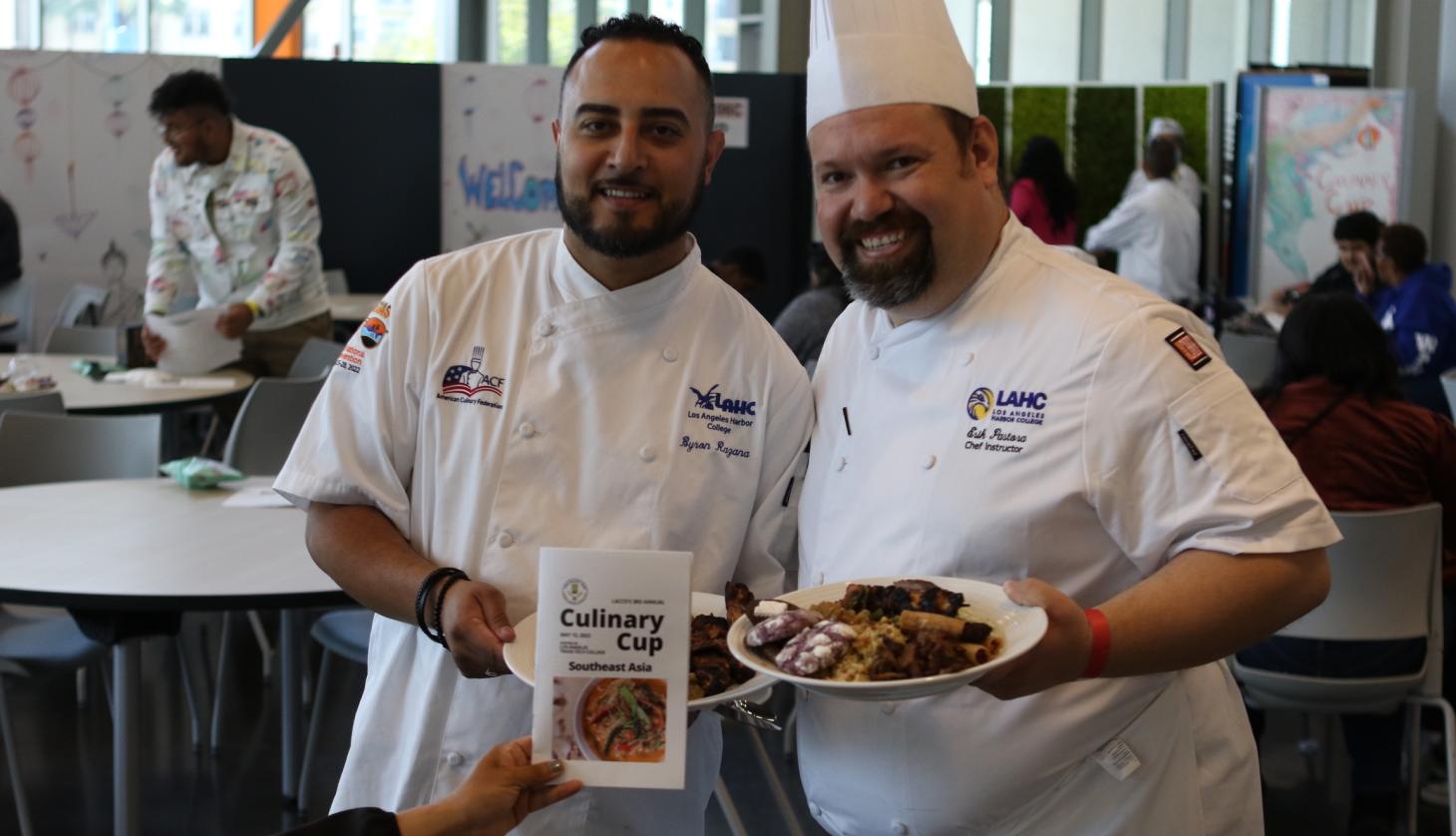 Chefs showing off the dish
